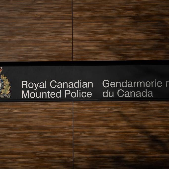 Officer says B.C. hostage was lying on top of captor before police gunfire erupted